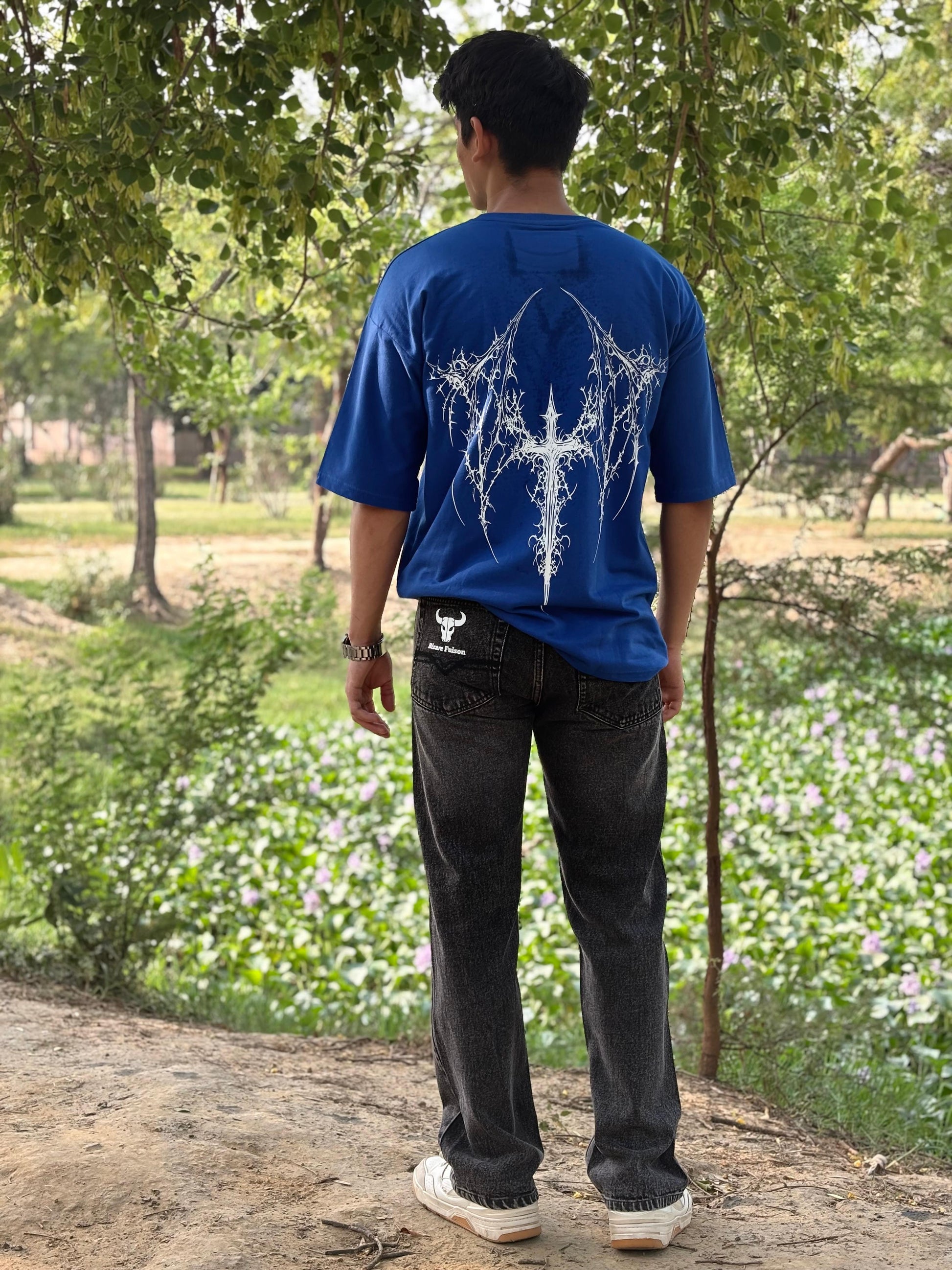 Angel wings gone metal — wear the chaos.